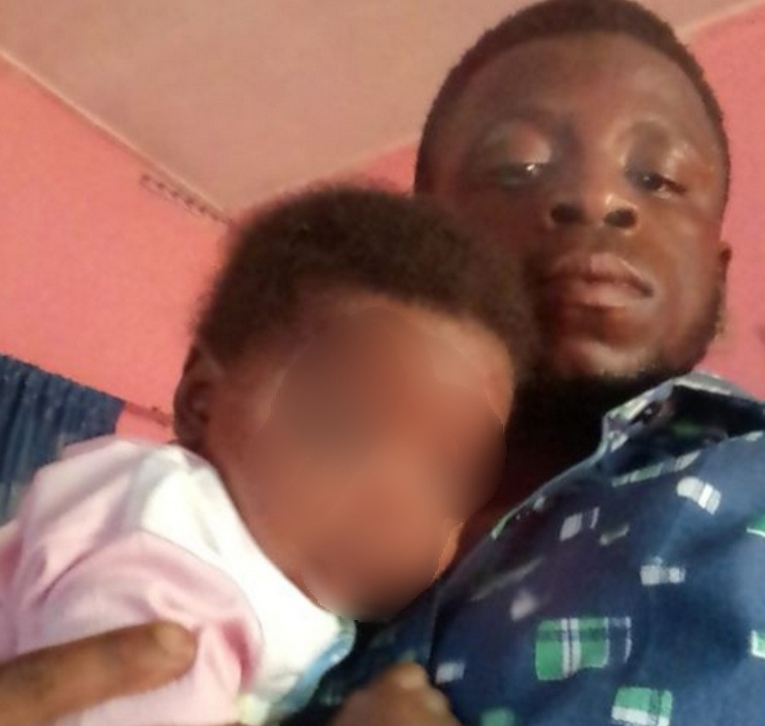 Nigerian Father Of Two Punishes His picture